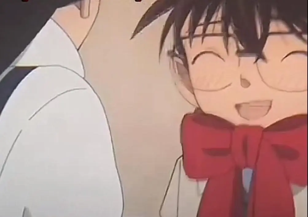 Conan’s unmistakable infatuated expression when Ran helps tie his scarf