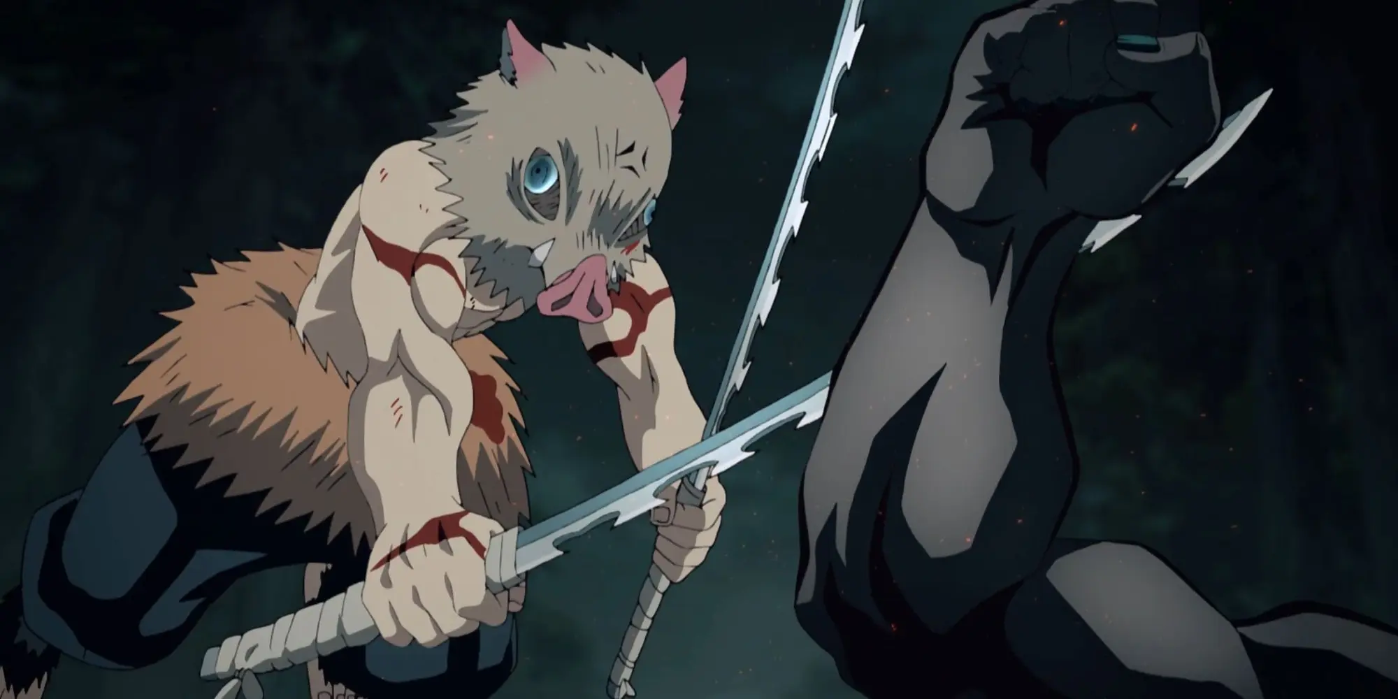 Inosuke fighting the Spider Demon in Demon Slayer