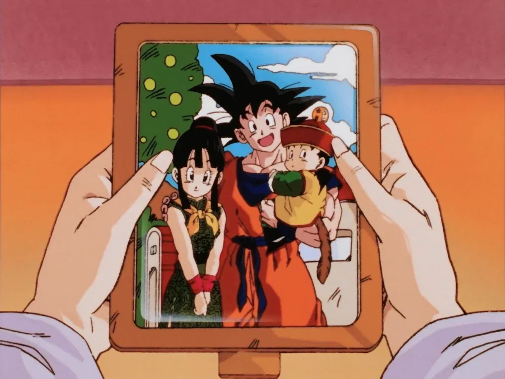 Future Chi-Chi holding a picture of her family