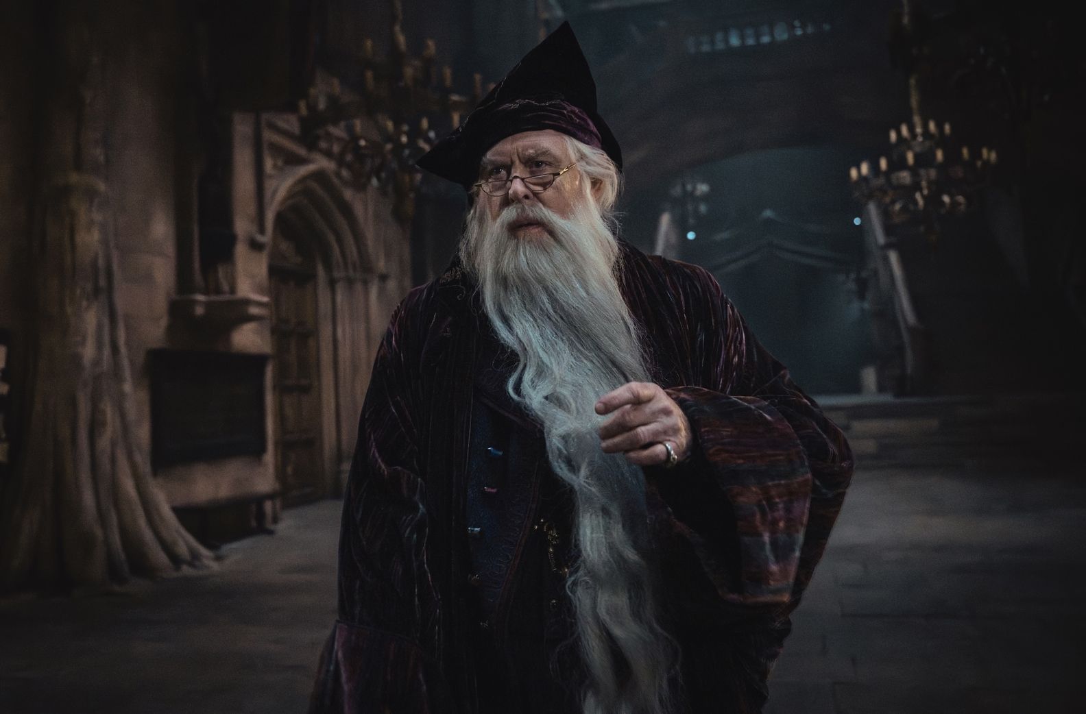 John Lithgow as Ollivander