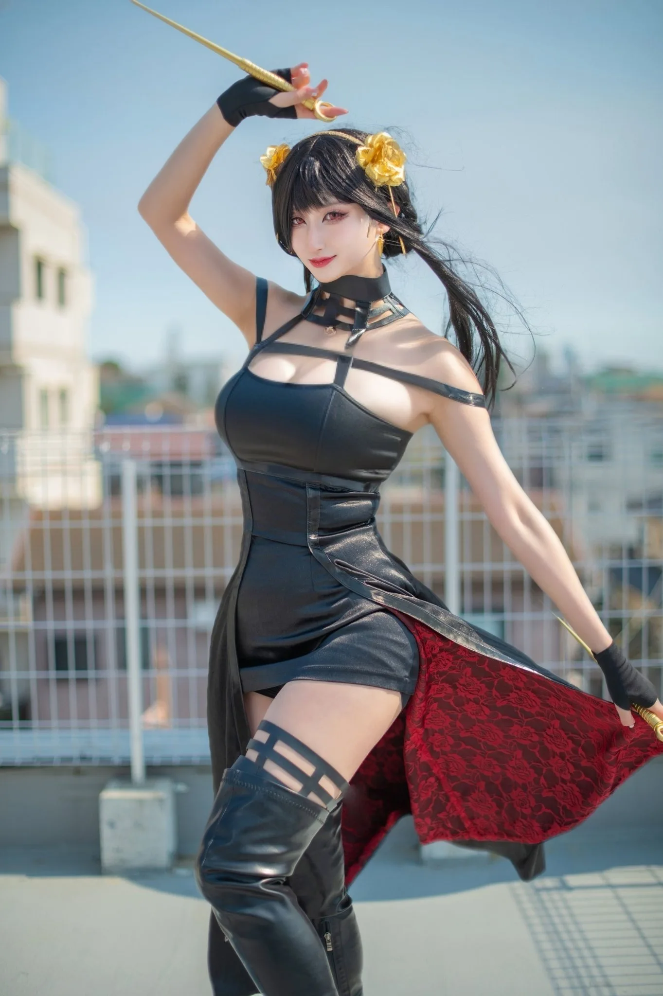 Cosplayer dressed as Yor Forger in classic black dress