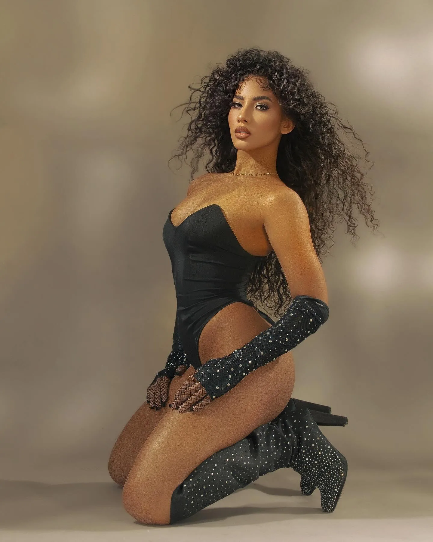 Chiquin in a stylish outfit tagged with photographers